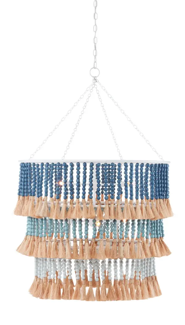 The St. Barts chandelier brings seaside elegance with hand-strung wood beads in ocean-inspired blues and whites. Designer Jamie Beckwith's artisanal approach creates movement and texture through knotted abaca rope tassels that flutter with air currents.