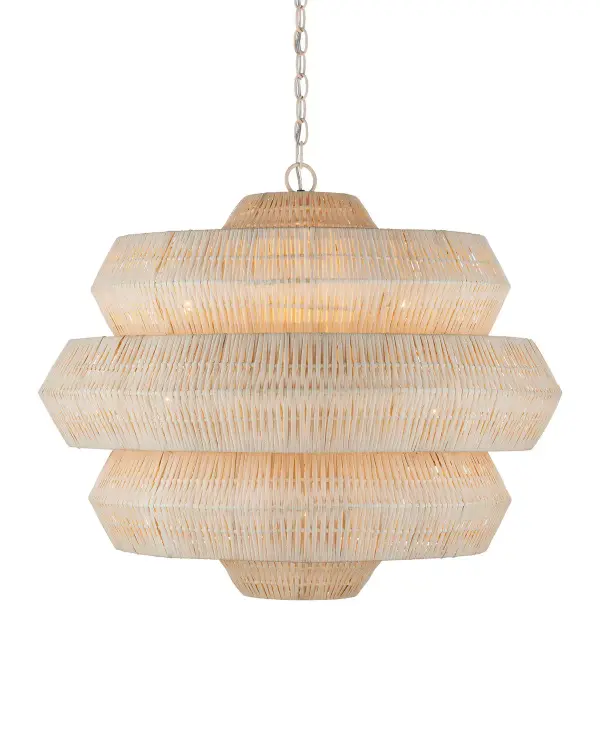 The Antibes chandelier showcases traditional rattan weaving techniques in a contemporary geometric form. Its bleached natural finish and snow-white frame create a light, airy presence that works beautifully in coastal and modern interiors alike.