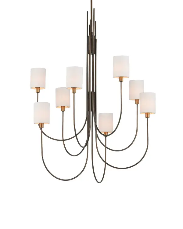 The Archetype Chandelier combines graceful arcing metalwork with a refined two-tone finish. Statuary bronze arms paired with antique brass bobeches create visual interest, while off-white linen shades provide warm, diffused light perfect for dining and entertaining spaces.