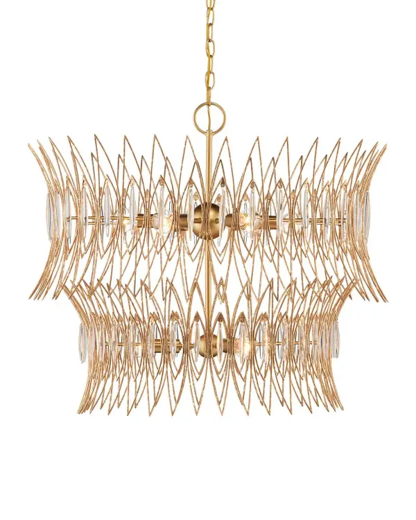 A stunning two-tiered chandelier inspired by mid-century jewelry design, featuring delicate wrought iron wires in a textured Luxor gold finish. Abstract leaf motifs adorned with oblong clear glass pieces create captivating light diffusion across nine bulbs.