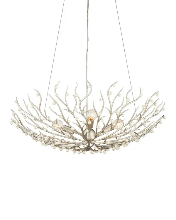 The Shinju chandelier brings nature-inspired elegance with hand-forged wrought iron branches adorned with fresh-water pearls. Its flowing, organic design creates a floating effect while the silver leaf finish adds contemporary sophistication.