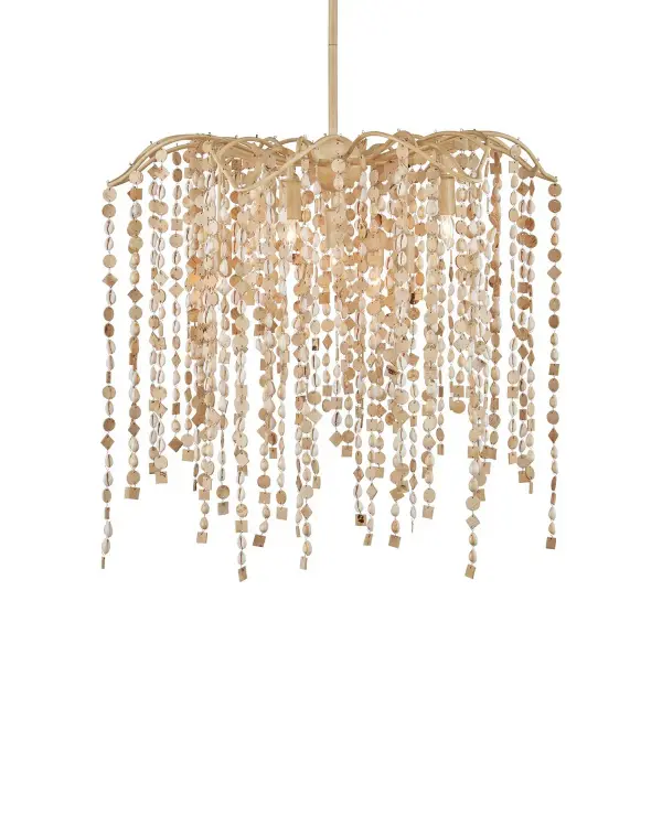 The Kealia chandelier brings organic beauty indoors with hand-beaded cowrie shells and coconut accents cascading from a sculptural wrought iron frame. Its natural materials create captivating light patterns while the soft coco cream finish adds warmth to coastal, organic modern, and artisanal spaces.