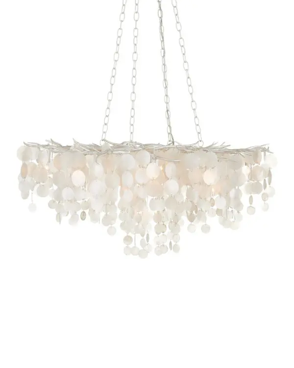 The Lusso brings coastal elegance with hand-cut capiz shells cascading from a hand-forged iron frame. Its layered, staggered design creates soft, diffused light perfect for large dining spaces or grand entryways.
