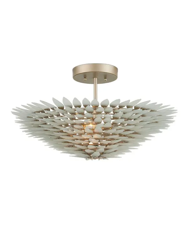 The Dahlia Semi-Flush Mount transforms recycled glass bottles into a stunning tiered fixture. Hand-cut glass pieces create a spiky, organic silhouette that catches light beautifully while the flower-shaped brads add artisanal charm.