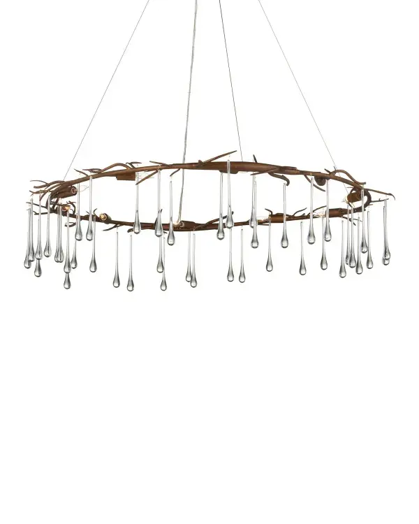 The Morning Grove brings natural elegance with its twig-like wrought iron frame in Rhine Gold finish, adorned with cascading crystals. At nearly 4 feet wide, it makes a stunning statement over large dining tables or islands.