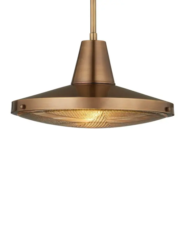 This antique car headlight-inspired pendant brings industrial charm to outdoor spaces. The antique brass finish and clear glass diffuser create warm, inviting illumination while standing up to the elements.