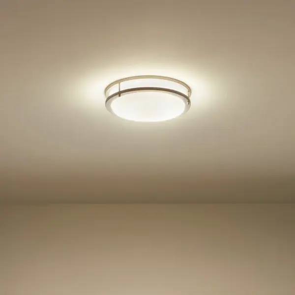 The Avon flush mount delivers 1900 lumens of warm 3000K LED light in a compact 14.25" profile. Brushed nickel finish and dimmable integrated LED make it ideal for low-ceiling spaces requiring efficient, maintenance-free lighting. - alternate view