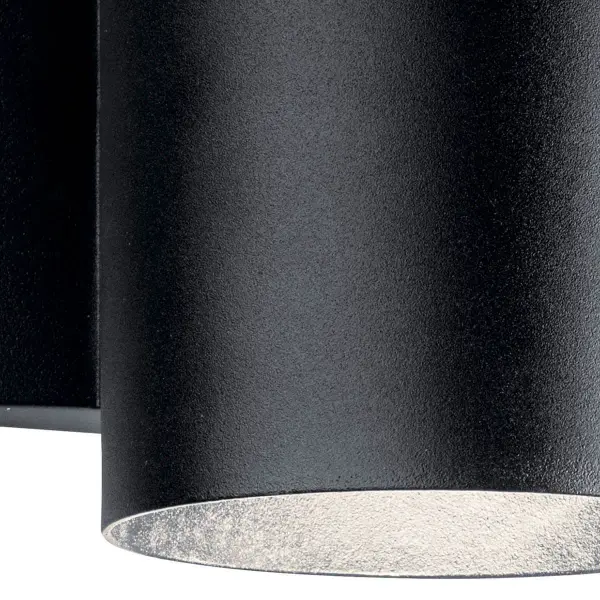 The Cylinder Outdoor Wall Light combines contemporary design with practical functionality. Its compact 5-inch width and textured black finish make it ideal for modern exteriors, while integrated LED technology ensures energy efficiency. - alternate view