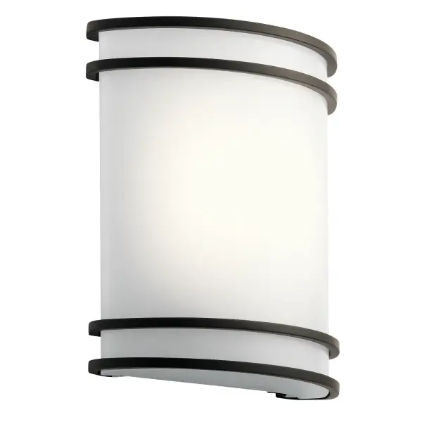 This compact LED wall sconce delivers reliable, energy-efficient lighting with a timeless Olde Bronze finish. The white acrylic diffuser provides even, glare-free illumination ideal for task and ambient lighting in bathrooms and hallways.