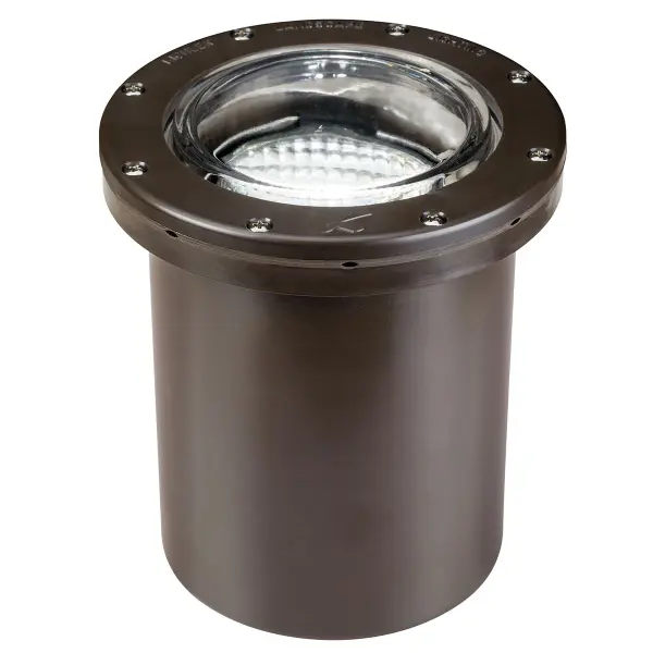 Low-voltage in-ground fixture designed for architectural and landscape accent lighting. Durable bronze construction withstands outdoor elements while providing focused illumination for pathways, gardens, and architectural features.
