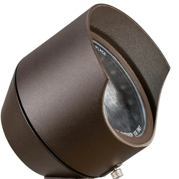 This compact 12V landscape spotlight delivers focused illumination for outdoor accent lighting. The textured architectural bronze finish provides durability and aesthetic appeal for residential and commercial landscapes. - alternate view