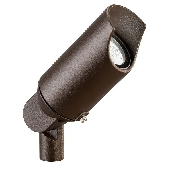This compact 12V landscape spotlight delivers focused illumination for architectural features, landscaping, and outdoor focal points. The textured bronze finish blends naturally with outdoor environments.