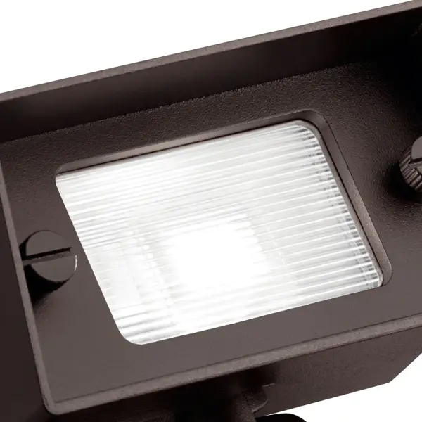 The Centennial Wall Wash delivers professional-grade accent lighting with a refined textured bronze finish. Its compact 4-inch design creates dramatic wall-washing effects perfect for highlighting architectural features. - alternate view