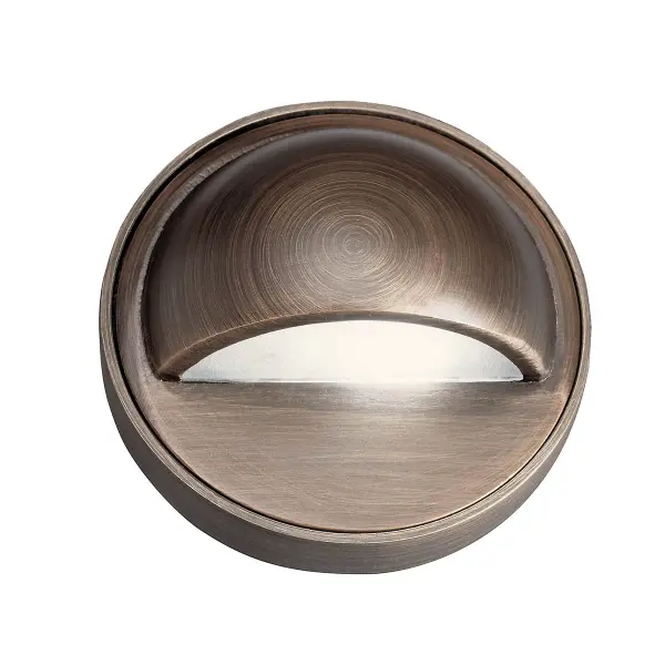 This compact 12V deck light features a timeless Centennial Brass finish, perfect for illuminating deck posts, railings, and outdoor pathways. Wet-rated for durability in all weather conditions.