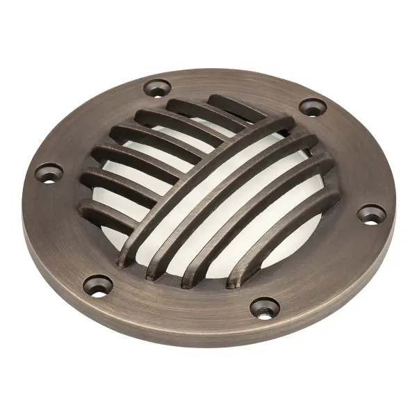 This rock guard accessory enhances in-ground fixtures with glare control and protection. The Centennial Brass finish coordinates with existing landscape lighting systems, while the optional clear lens provides flexibility for different lighting effects.