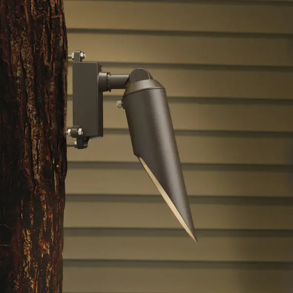 This mini accent light delivers focused downlighting with an extended cowl design that minimizes glare. The durable aluminum construction and wet-rated certification make it ideal for exterior applications requiring precise accent lighting.