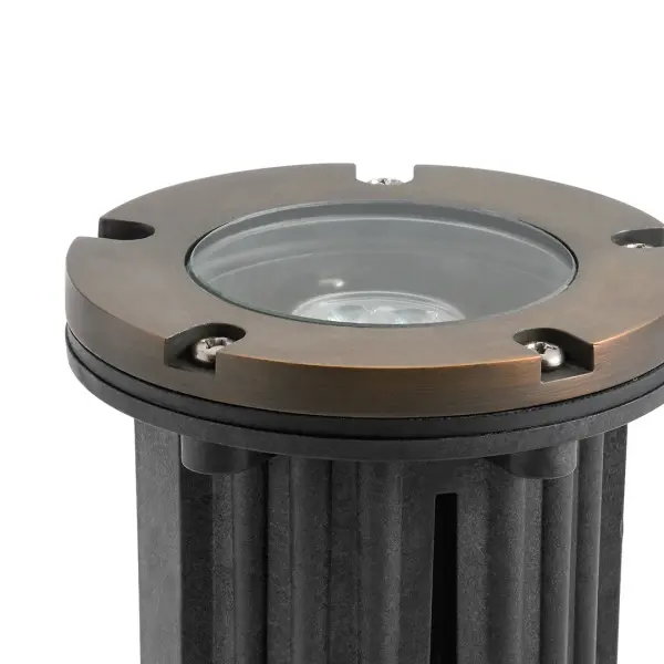 This compact 5-inch in-ground fixture delivers focused accent lighting with a sophisticated Centennial Brass finish. Wet-rated for durability and operating on safe 12V systems, it's ideal for uplighting trees, architectural features, or garden focal points. - alternate view