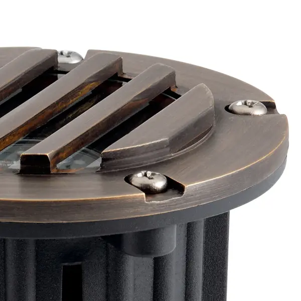 This compact 12V in-ground accent light delivers focused illumination with a sophisticated Centennial Brass finish. Wet-rated for durability, it's ideal for uplighting trees, architectural features, or garden focal points. - alternate view