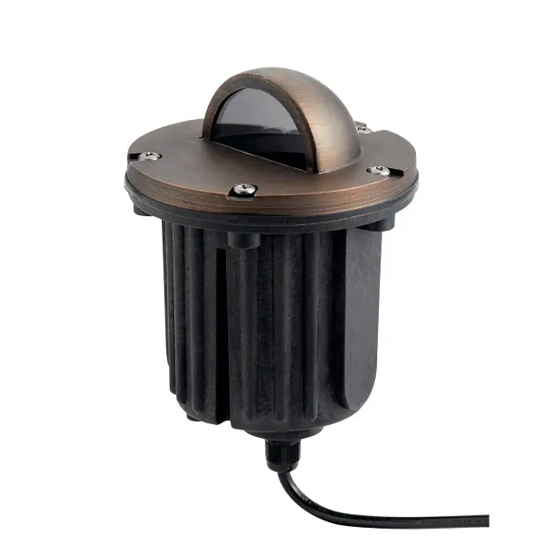 This compact in-ground accent light features durable Centennial Brass finish and wet-rated construction. Perfect for highlighting landscape features, pathways, and architectural elements with warm halogen illumination.