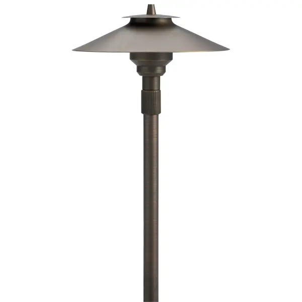 This traditional brass path light combines timeless design with practical functionality. The adjustable height feature and wet-rated construction make it ideal for illuminating walkways, gardens, and outdoor living areas.