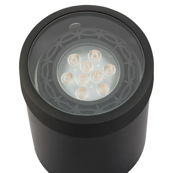 This compact in-ground accent light delivers focused illumination for pathways, gardens, and architectural features. The black brass finish offers a sophisticated look that complements modern and traditional landscapes alike. - alternate view