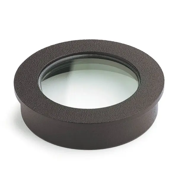 Compact replacement lens for landscape lighting fixtures in durable textured architectural bronze finish. Designed for outdoor use with weather-resistant construction.
