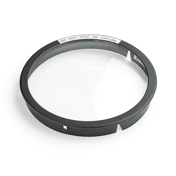 A compact 6-inch diameter lens accessory designed for landscape lighting systems. Features durable black material construction for outdoor applications and easy integration with existing fixtures.