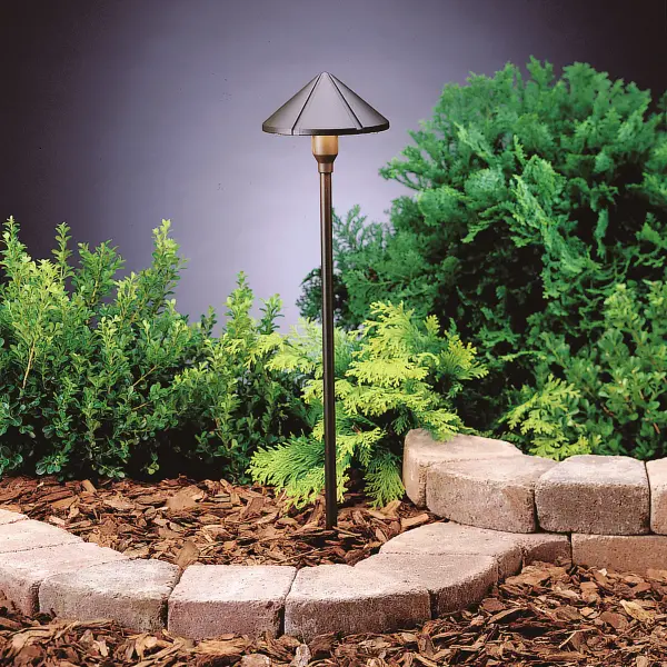 This low-profile LED path light delivers warm 2700K illumination with exceptional 40,000-hour lifespan. The center mount design maximizes light spread while the textured bronze finish resists weathering in outdoor conditions.