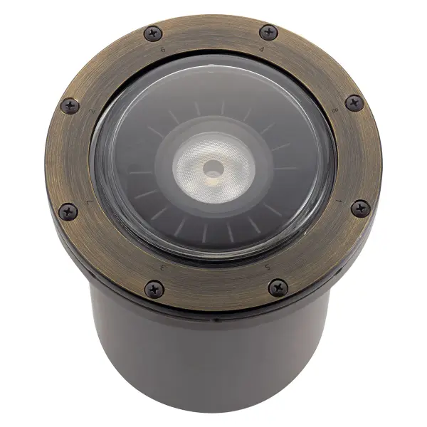 This integrated LED in-ground fixture delivers 850 lumens of warm 2700K light with a focused 35-degree beam. The durable Centennial Brass finish and wet-rated construction make it ideal for uplight accents on architecture, trees, and landscape features.