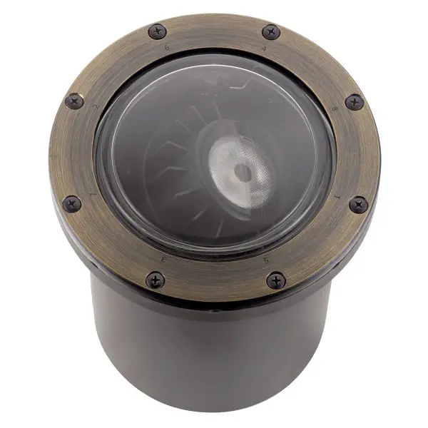 This integrated LED in-ground fixture delivers 850 lumens of warm 2700K light with a focused 35-degree beam. The durable Centennial Brass finish and wet-rated construction make it ideal for uplight accents on architecture, trees, and landscape features. - alternate view
