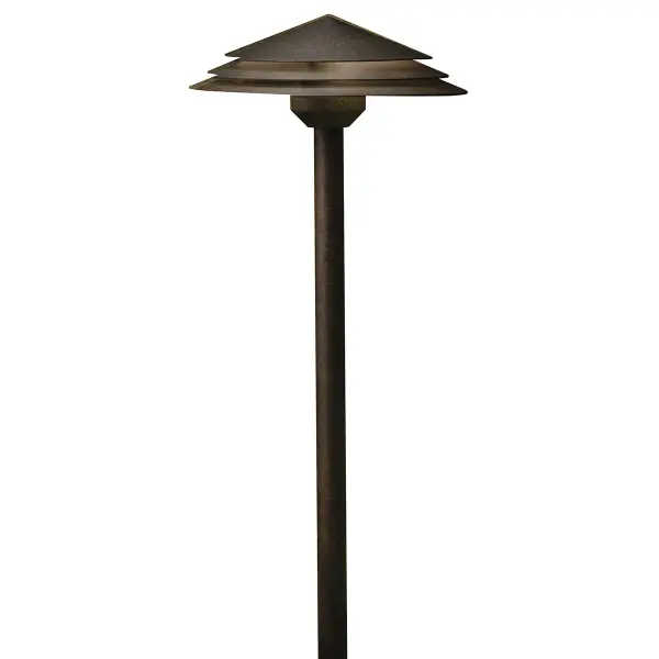 This cascading tiered path light delivers warm 2700K LED illumination with architectural appeal. The aged bronze finish and aluminum construction ensure durability in wet locations while the integrated LED provides energy-efficient lighting.