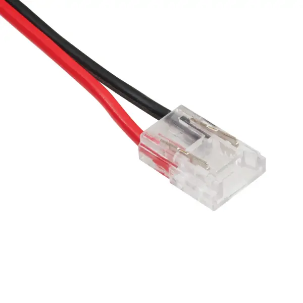This terminal block connector simplifies COB tape light installations with a pre-attached 6-foot supply lead wire. Designed specifically for Kichler 6T Series COB Tape Light, it provides a secure, reliable connection between tape and power supply.