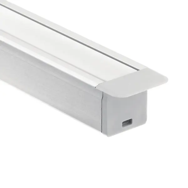 This aluminum extrusion kit provides a sleek, professional solution for recessed tape lighting in cabinetry, shelving, and architectural details. The deep channel design with opaque lens creates beautifully diffused illumination.