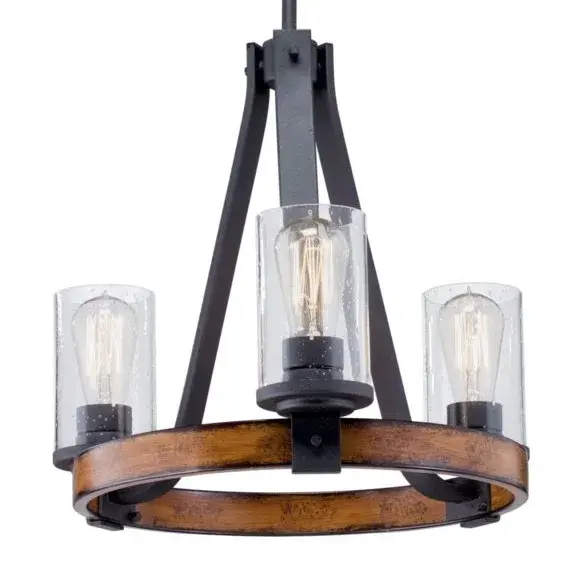 The Barrington Chandelier brings rustic farmhouse charm with its distressed black finish and clear seeded glass shades. At 18 inches wide, it's perfectly sized for smaller dining areas, kitchen islands, or entryways.
