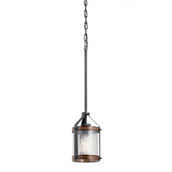 The Barrington Mini Pendant combines farmhouse charm with industrial edge through its distressed black finish and clear seeded glass shade. At 5.5 inches wide, it's perfectly sized for task lighting or clustered installations.
