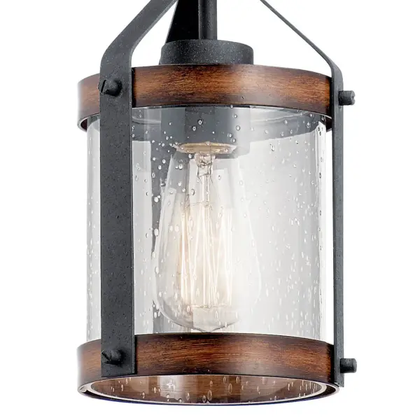 The Barrington Mini Pendant combines farmhouse charm with industrial edge through its distressed black finish and clear seeded glass shade. At 5.5 inches wide, it's perfectly sized for task lighting or clustered installations. - alternate view