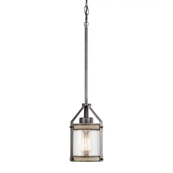 The Barrington Mini Pendant delivers authentic industrial style in a compact 5.5-inch format. Its anvil iron finish and clear seeded glass shade create visual interest while providing focused task lighting perfect for kitchen islands or intimate spaces.