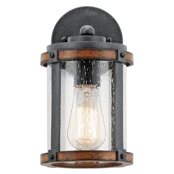 The Barrington Outdoor Wall Light combines farmhouse aesthetics with practical outdoor lighting. Its distressed black finish and seeded glass create vintage appeal while the compact 10-inch size fits various exterior spaces. - alternate view