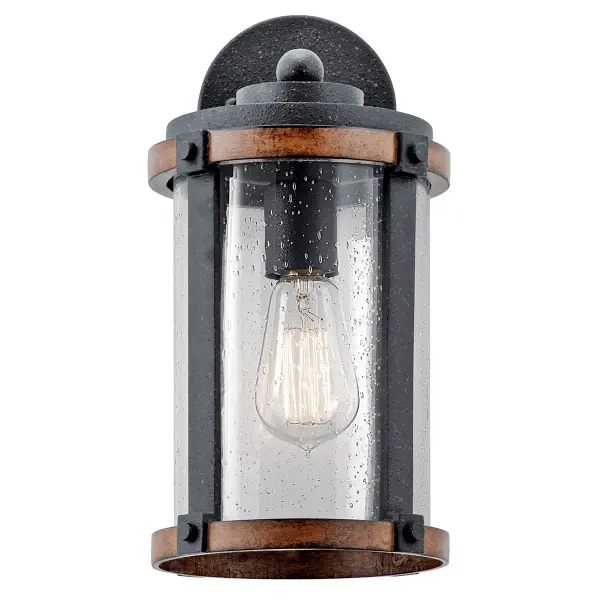 The Barrington Outdoor Wall Light combines farmhouse aesthetics with practical outdoor lighting. Its distressed black finish and clear seeded glass create vintage appeal while providing reliable illumination for entryways and patios. - alternate view