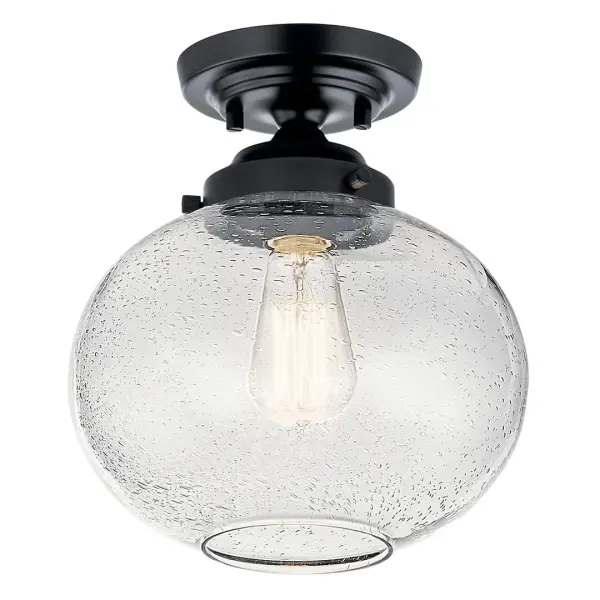 The Avery semi-flush mount combines a classic black finish with clear seeded glass for a versatile look that works in transitional and farmhouse spaces. Its compact 9.75" diameter makes it ideal for smaller rooms and tight spaces.