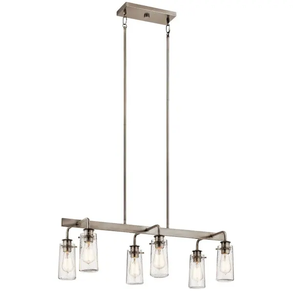 The Braelyn Linear Chandelier combines transitional styling with farmhouse appeal through its Classic Pewter finish and clear seeded glass shades. The 6-light linear design provides excellent illumination over dining tables and kitchen islands. - alternate view