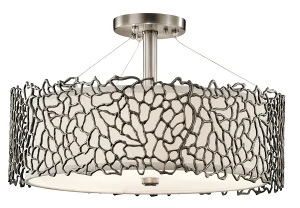 The Silver Coral pendant brings organic elegance to contemporary spaces with its nature-inspired design and versatile mounting options. The Classic Pewter finish and layered shade create soft, diffused lighting perfect for intimate settings.