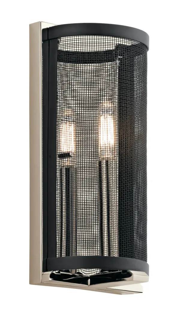 The Titus wall sconce combines industrial black mesh ironwork with a sleek polished nickel finish for a contemporary edge. Compact at 6 inches wide, it's ideal for smaller spaces needing focused ambient lighting.