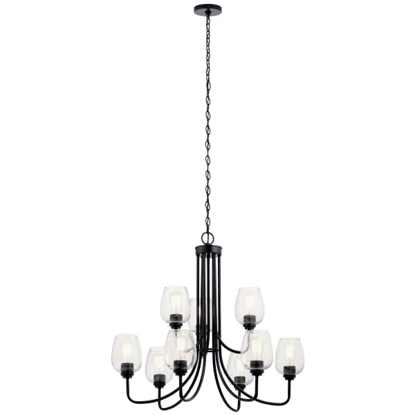 The Valserrano chandelier brings sophisticated elegance with its wine goblet-inspired silhouette. Nine lights provide ample illumination through clear seeded glass, creating beautiful light patterns. The substantial 31.75-inch width makes a statement without overwhelming spaces.
