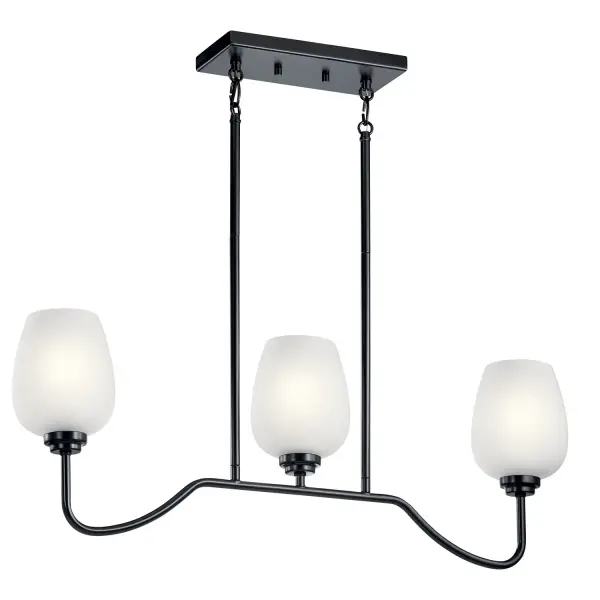 The Valserrano linear chandelier brings sophisticated simplicity to dining and kitchen spaces. Its wine goblet-inspired silhouette pairs gracefully with satin etched glass shades, creating soft, diffused light perfect for intimate gatherings.