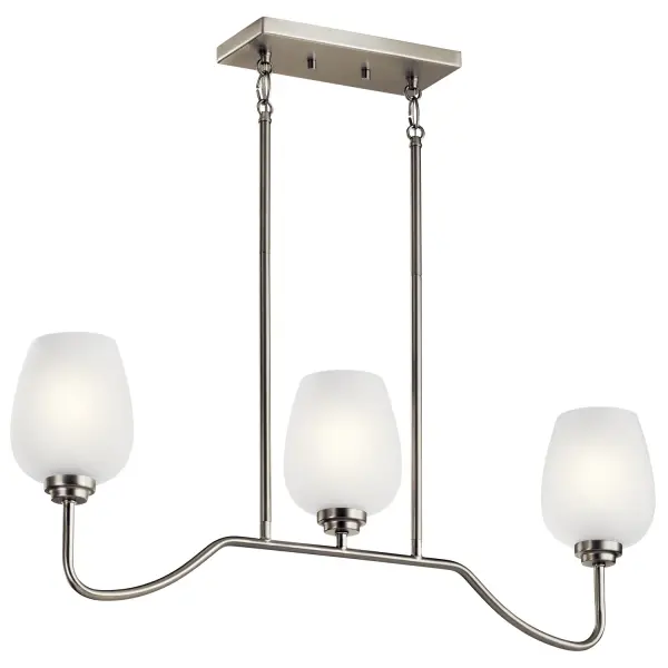 The Valserrano linear chandelier brings sophisticated simplicity to dining and kitchen spaces with its wine goblet-inspired silhouette. The brushed nickel finish and satin etched glass create a refined, versatile look that bridges traditional and contemporary styles.