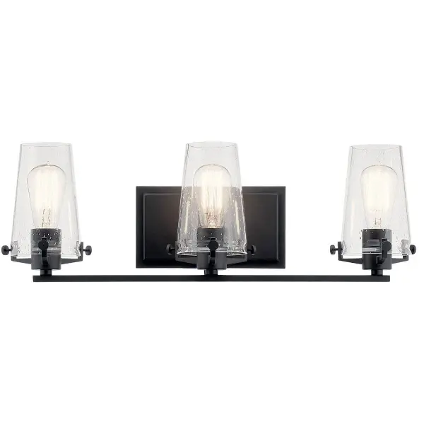 The Alton vanity light combines transitional styling with industrial accents, featuring clear seeded glass shades and a sleek black finish. At 24 inches wide, it's perfectly sized for medium vanities and offers flexible up or down mounting. - alternate view