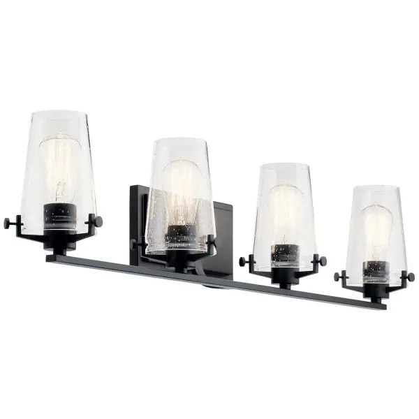 The Alton vanity light combines transitional elegance with industrial character through its black finish and clear seeded glass shades. At 33.75 inches wide, it provides ample illumination for medium to large vanities.