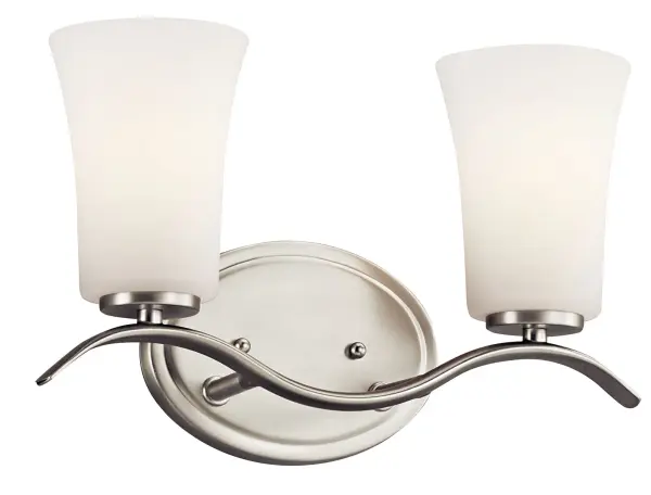 The Armida vanity light combines brushed nickel finish with clear satin etched glass for a refined look. Dimmable and damp-rated, it's ideal for bathrooms. The 14-inch width suits single vanities perfectly.