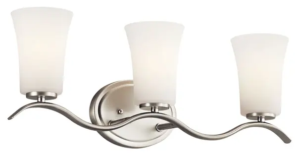 The Armida vanity light combines brushed nickel finish with satin etched opal glass for soft, even illumination. Its 23-inch width makes it ideal for standard bathroom vanities, while dimmable capability and damp rating ensure versatility. - alternate view